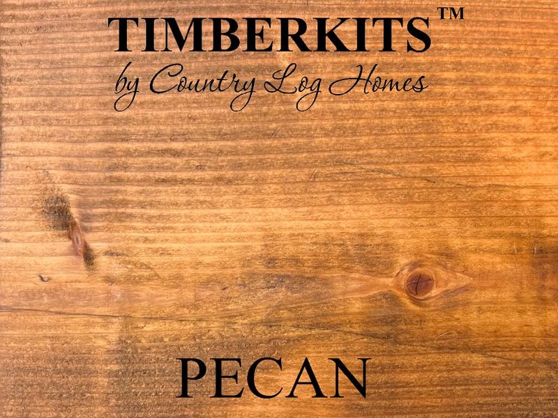 Sample of wood Pecan stain with logo Timberkits by Country Log Homes